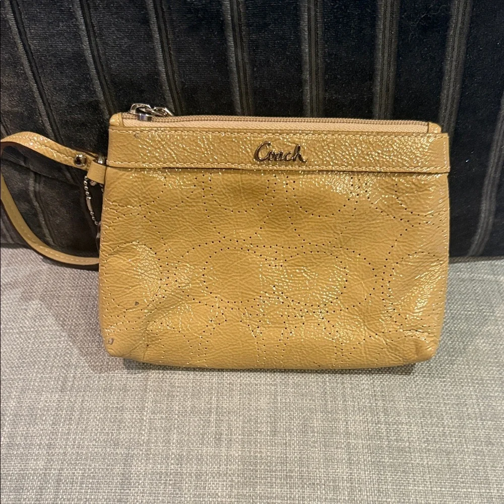 Coach Perforated Signature Gold Leather Wristlet